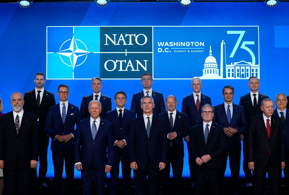 <i>Kent Nishimura/Getty Images via CNN Newsource</i><br/>Heads of state pose for a group photo during the NATO 75th anniversary celebratory event on July 10