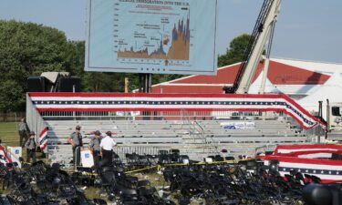 Security personnel inspect the scene in Butler