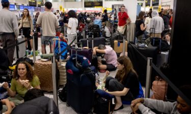 Long queues of passengers form at the check-in counters at Ninoy Aquino International Airport in Manila