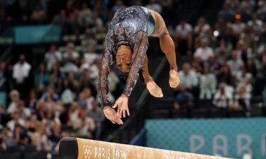 Simone Biles competes in the qualifying round at the Paris Olympics.