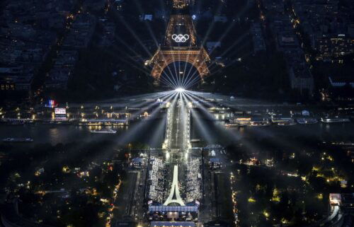The Eiffel Tower and the Olympics rings are lit up during the opening ceremony for the 2024 Summer Olympics in Paris