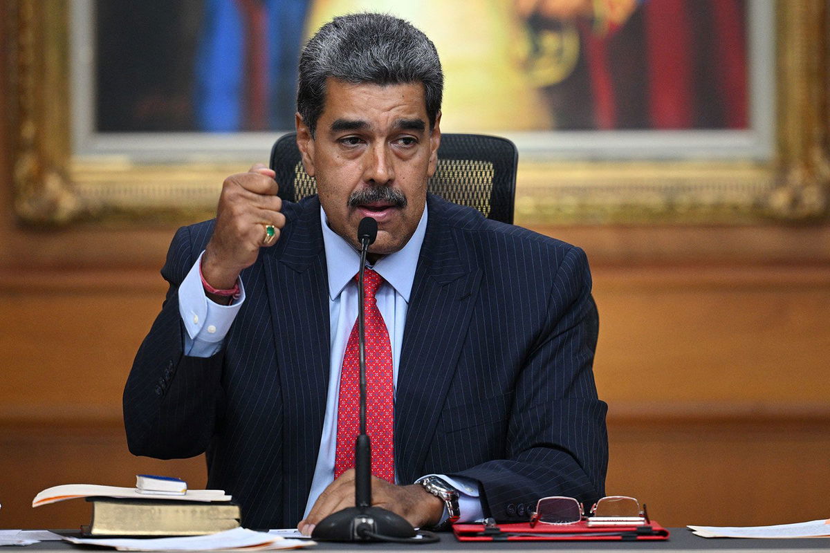 <i>Federico Parra/AFP/Getty Images via CNN Newsource</i><br/>Venezuelan President Nicolas Maduro gestures talks about the election during a press conference with the international media in Caracas on July 31