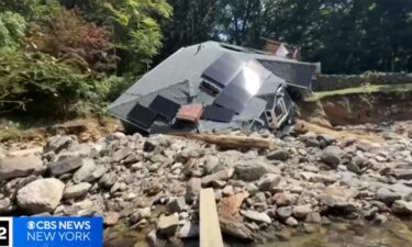 Incredible video captured the moment a house in Oxford collapsed on Sunday after its foundation was washed away by floodwater.