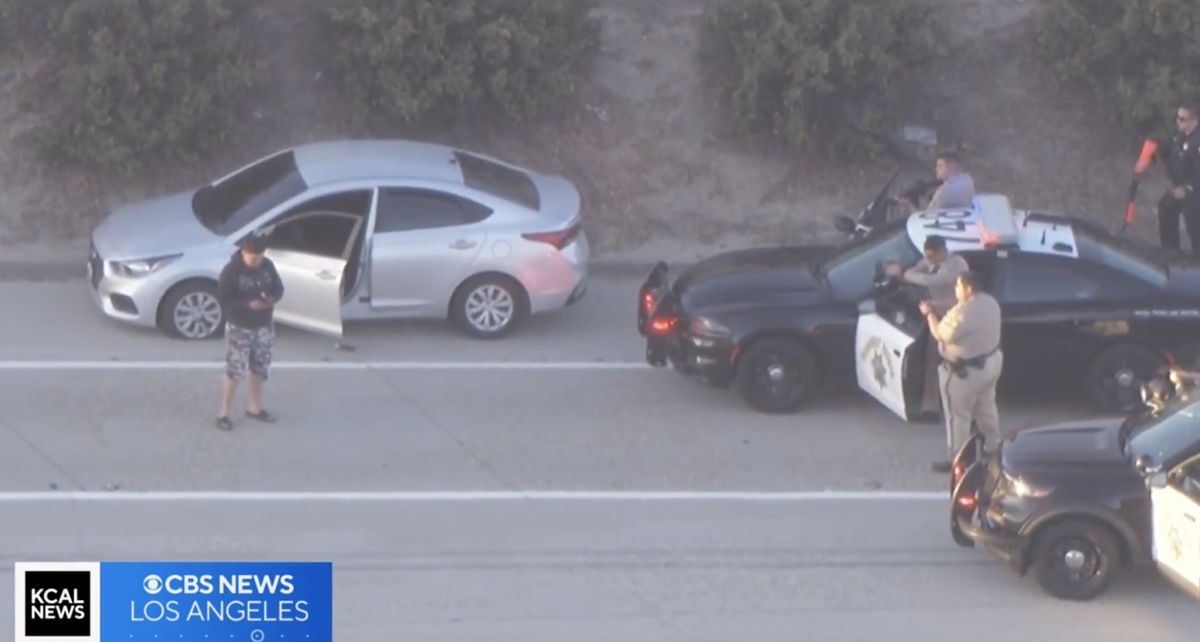 <i>KCAL/KCBS via CNN Newsource</i><br/>A pursuit suspect decided to make a phone call instead of surrendering to officers during a standoff on the 118 Freeway on August 22.