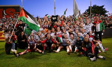 Palestinian players celebrate their first goal during the international solidarity match between Bohemians and Palestine at Dalymount Park in Dublin.