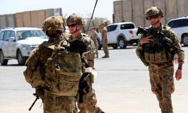 FILE PHOTO: U.S. soldiers are seen during a handover ceremony of Taji military base from US-led coalition troops to Iraqi security forces