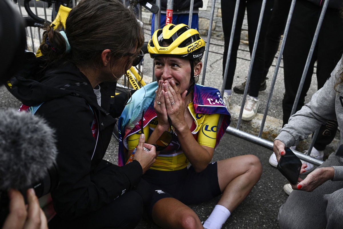 <i>Julien De Rosa/AFP/Getty Images via CNN Newsource</i><br/>Kasia Niewiadoma was overwhelmed by winning the Tour de France Femmes at the finish line.