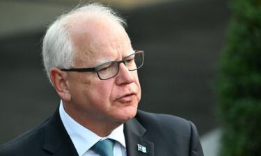 Minnesota Gov. Tim Walz speaks to reporters after meeting with US President Joe Biden at the White House in Washington