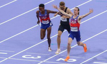 Hocker (right) and Nuguse cross the finish line of the men's 1