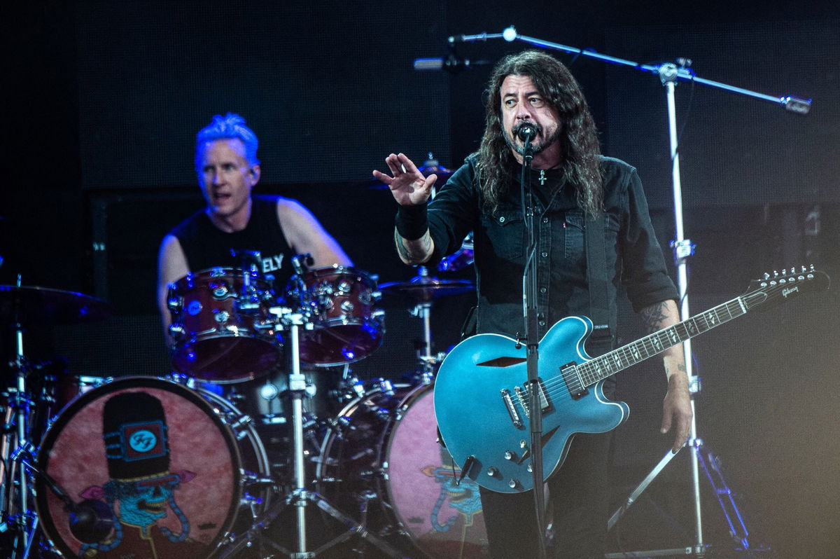 <i>Helle Arensbak/Ritzau Scanpix/AFP/Getty Images via CNN Newsource</i><br/>(From left) Foo Fighters drummer Josh Freese and Dave Grohl performing at the Roskilde Festival in Denmark in July.