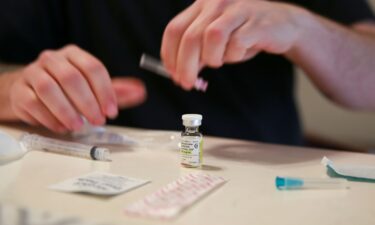 Lucas prepares his weekly testosterone shot at his home in Casselberry