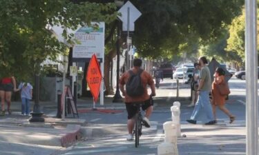 A woman remains in the hospital after she was walking in a crosswalk on Sutterville Road earlier this week. Now the city of Sacramento is considering declaring a state of emergency to fund resources to continue to try to stop pedestrian and cyclist deaths in the city.