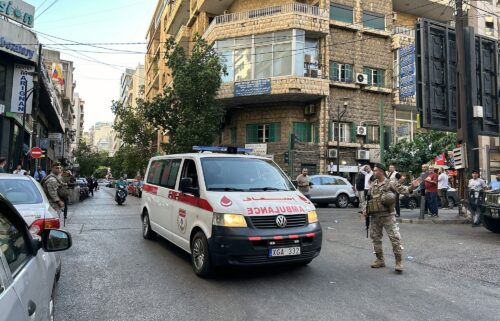 An ambulance rushes wounded people to a hospital in Beirut on September 17