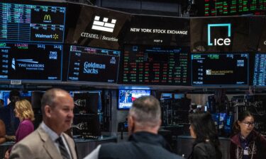 Traders work on the floor of the New York Stock Exchange on September 18 in New York City.