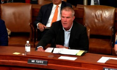 Brett Favre speaks during a House Ways and Means Committee hearing on September 24.