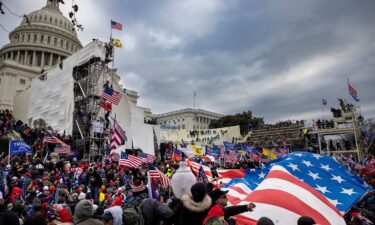 Trump supporters clash with police and security forces as people storm the US Capitol on January 6