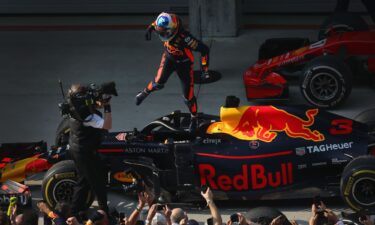 Ricciardo celebrates winning the 2018 Chinese Grand Prix with Red Bull.