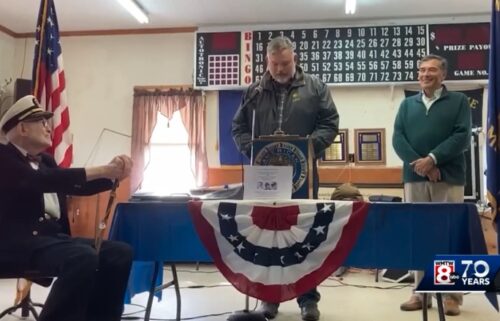 A crowd filled the American Legion hall in Oxford Sunday for a community celebration marking local resident John Crumpton's 100th birthday.