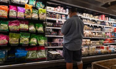 A customer shops at a store in Brooklyn on August 14