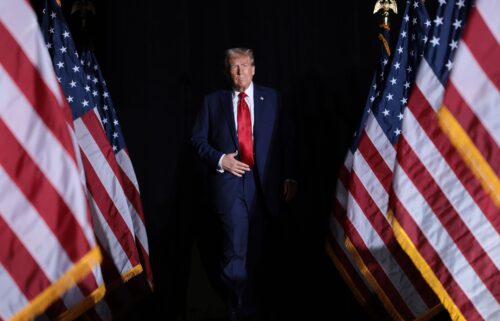 Former President Donald Trump arrives at a campaign rally on October 18 in Detroit