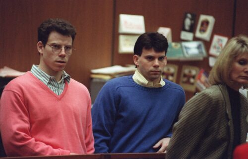 Erik Menendez (R) and brother Lyle listen to court proceedings during a May 17