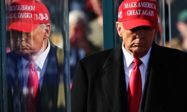 Former President Donald Trump walks off stage after speaking during a campaign rally at Lancaster Airport on November 3 in Lititz