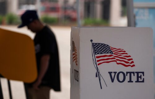 A voter casts ballot during the early voting process at a polling station ahead of the upcoming 2024 presidential election on October 27