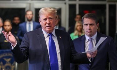 Donald Trump speaks alongside his attorney Todd Blanche as he arrives for his hush money trial at Manhattan Criminal Court on May 30 in New York City.