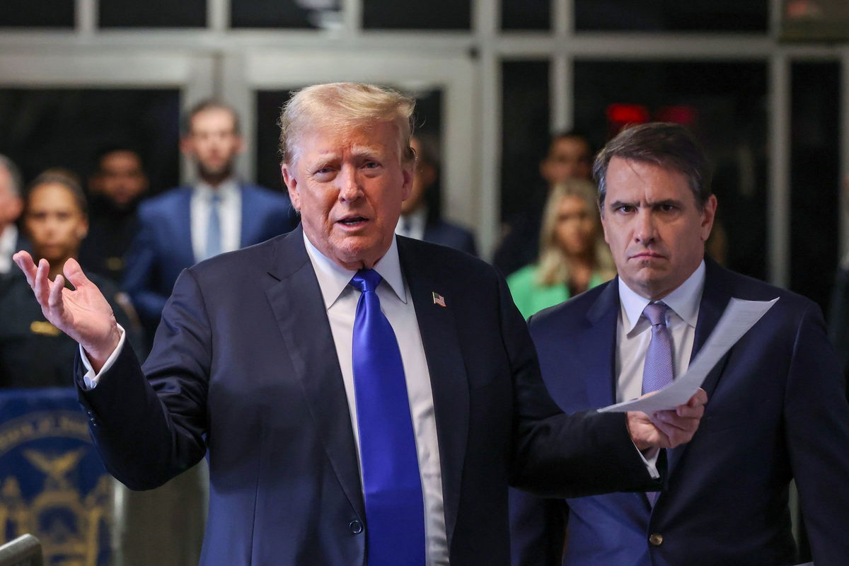 <i>Michael M. Santiago/Getty Images via CNN Newsource</i><br/>Donald Trump speaks alongside his attorney Todd Blanche as he arrives for his hush money trial at Manhattan Criminal Court on May 30 in New York City.