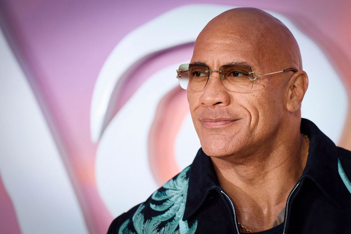 <i>Benjamin Cremel/AFP/Getty Images via CNN Newsource</i><br/>Dwayne Johnson poses on the red carpet upon arrival for the UK Premier of 