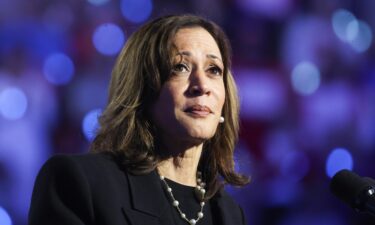 Vice President Kamala Harris makes her way to board Air Force Two before departing Dane County Regional Airport in Madison