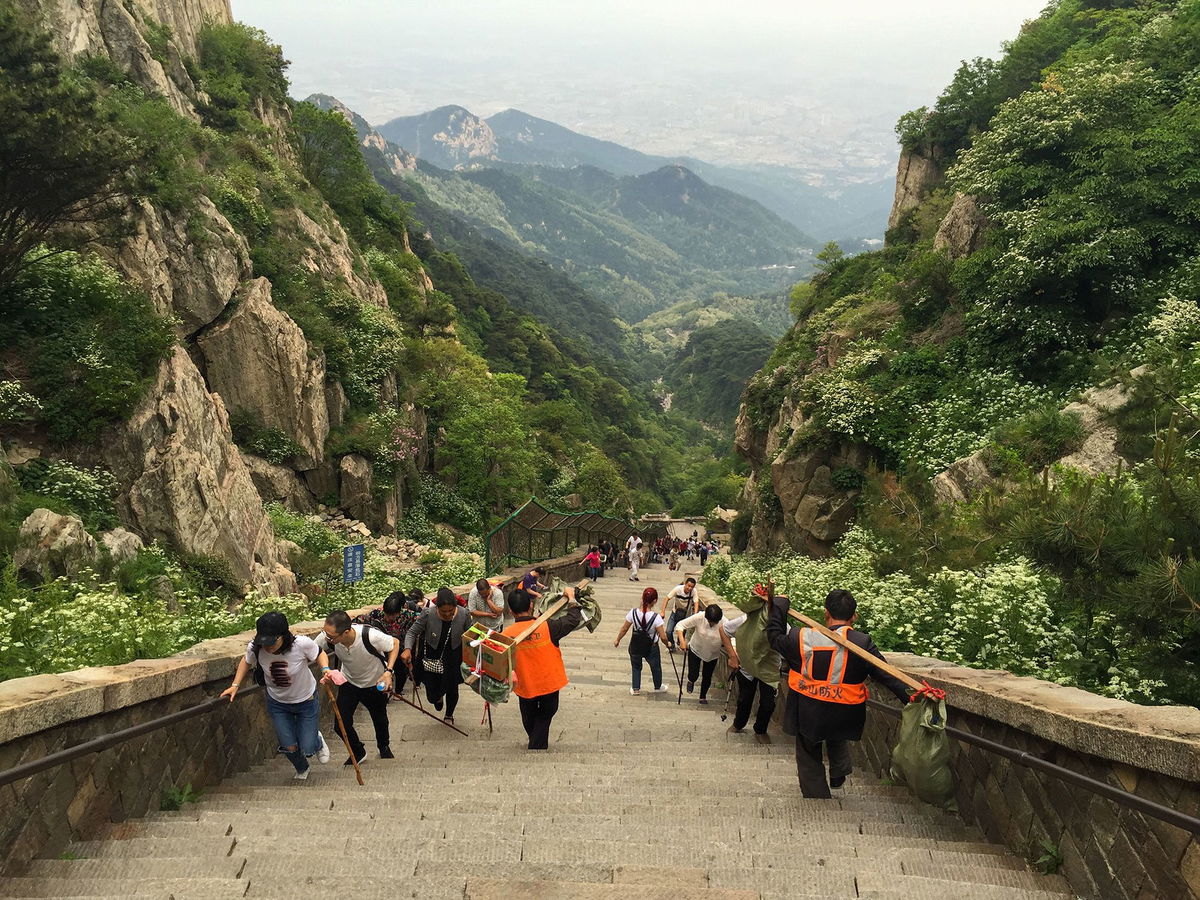 <i>Zhao Liu/iStock Unreleased/Getty Images via CNN Newsource</i><br/>Tourists at Tai Mountain