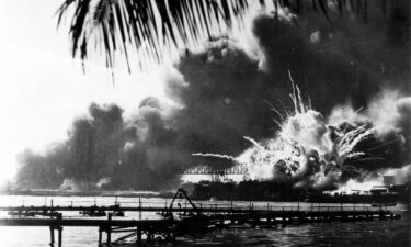 The American destroyer USS Shaw explodes during the Japanese attack on Pearl Harbor