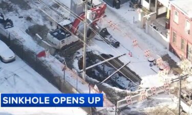 A massive sinkhole opened in a Hunting Park roadway just moments after a SEPTA bus passed over a buckling section of the street.