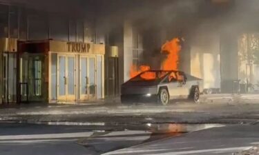 A Tesla Cybertruck is on fire in front of the Trump International Tower in Las Vegas on Wednesday