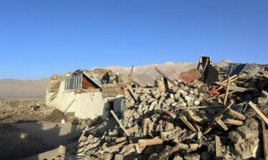 Rescue workers search for survivors in the aftermath of an earthquake in Changsuo Township of Dingri in Xigaze