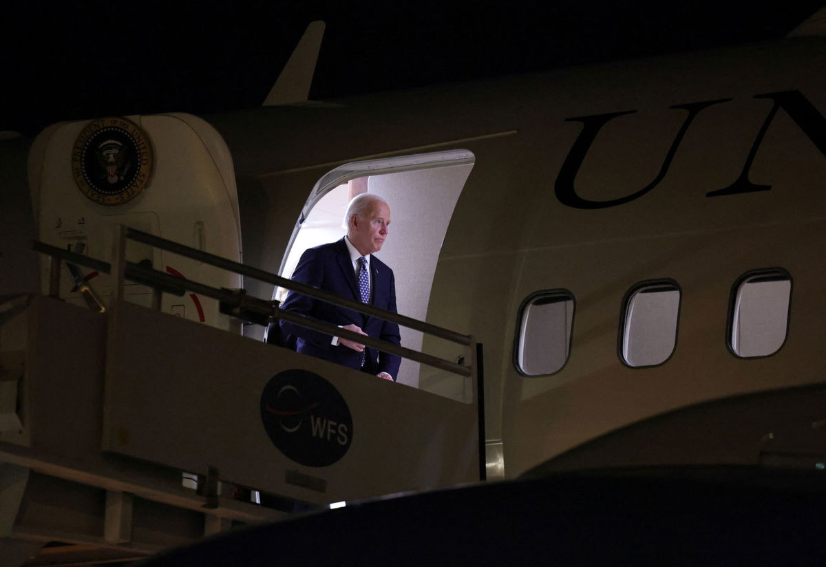 <i>Kevin Lamarque/Reuters via CNN Newsource</i><br/>President Joe Biden steps from Air Force One as he arrives in Los Angeles. Wildfires in California have broken out and escalated significantly since Biden touched down in Los Angeles on January 6