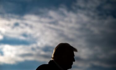 President Donald Trump speaks to members of the press as he prepares to depart the White House aboard Marine One on January 24