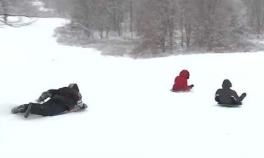 Families fly down Louisville's most popular sledding hills.