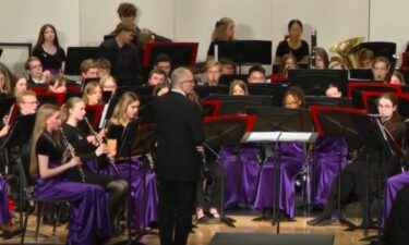 Central Iowa students were the first to play an original piece composed in memory of their band director's daughter