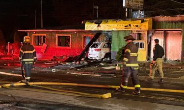A car plowed into the Caribbean Cuisine restaurant and set fire to the building on April 14.
