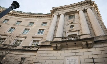 A sign for the Internal Revenue Service is seen on its building on February 13 in Washington