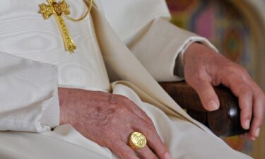 Pope Francis' Fisherman’s Ring is pictured in the Vatican's guide book for the inauguration mass in 2013. The late pope eschewed tradition by choosing a gold-plated silver ring