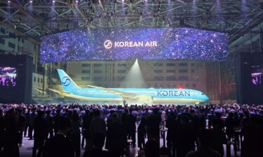 The new logo of Korean Air is seen on its plane during an event in Gimpo
