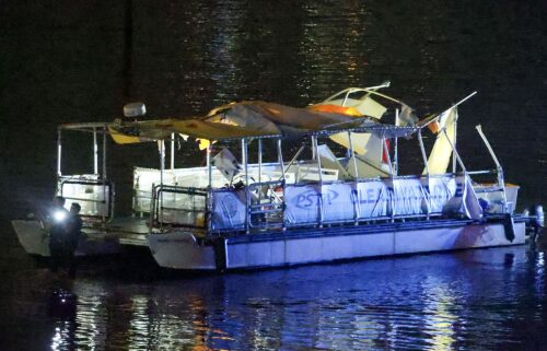 Investigators search the wreckage of a Clearwater Ferry after a boat crashed into the ferry on Sunday
