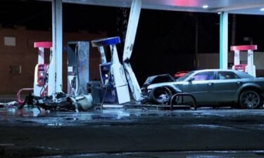 A car crashed into a gas pump and caught fire on Cleveland's east side early Wednesday morning.