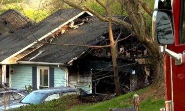 One Buncombe County woman witnessed her neighbor's house fully engulfed in flames after hearing multiple explosions coming from a home on April 18.