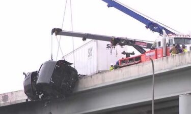 Newly released 911 calls from a semitruck hanging over Interstate 65 near the Kennedy Bridge give perspective from the driver and those who witnessed it.