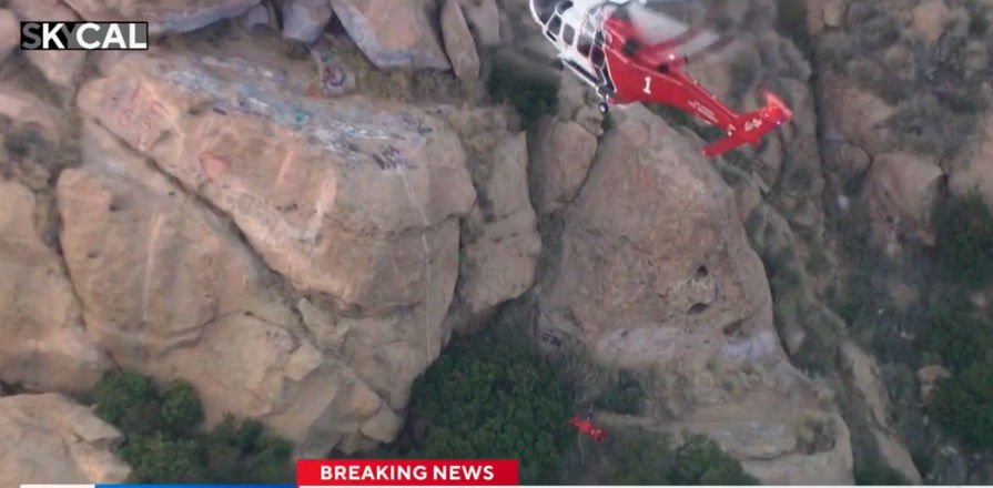 <i>KCAL/KCBS via CNN Newsource</i><br/>Firefighters rescued a hiker who fell nearly 30 feet from a popular rock climbing area in Chatsworth on May 25.