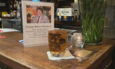 Beer left on the bar at Cheers Boston after the death of George Wendt who played Norm in the sitcom.